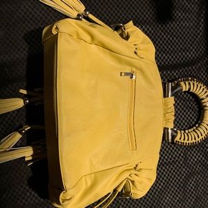 Yellow purse with tassels